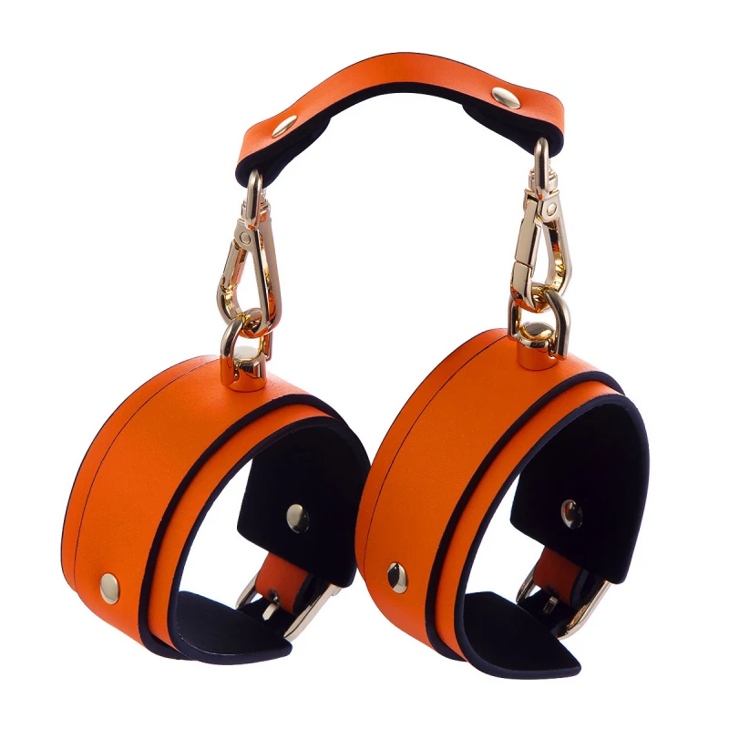 Наручники светящиеся в темноте Fetish Boutique Glow-In-The-Dark Ankle Cuffs Orange